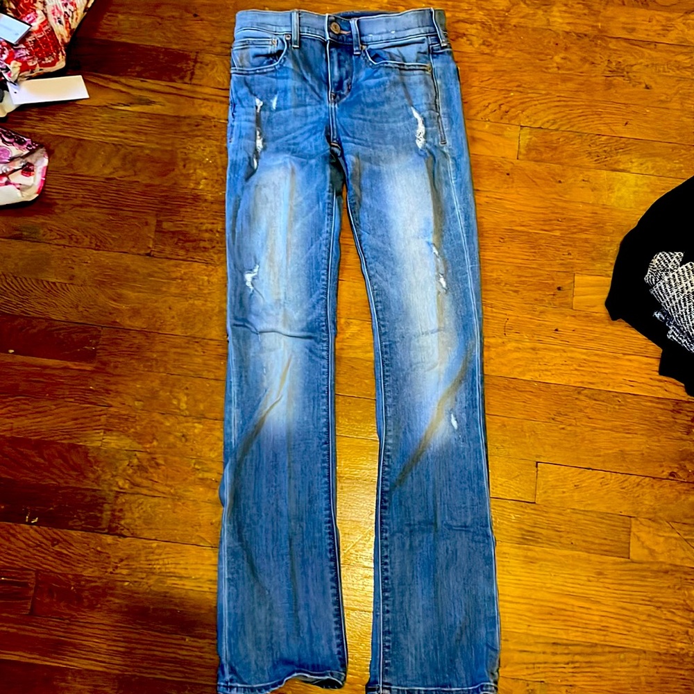Express barely boot mid rise jeans. Never worn.